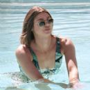 Raquel Leviss – Displays her green bikini at the pool in Scottsdale, Arizona - 454 x 681