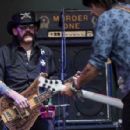 Lemmy and Phil Campbell from Motorhead performs on The Pyramid Stage during the Glastonbury Festival at Worthy Farm, Pilton on June 26, 2015 in Glastonbury, England - 454 x 296