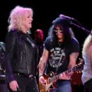 Slash performs at 'Across The Great Divide' benefit concert presented by UpperWest Music Group at Ace Theater Downtown LA on October 19, 2018 in Los Angeles, California
