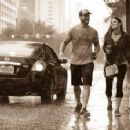 CM Punk and Lita walking in the rain - 400 x 224