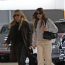 Miley Cyrus – With mom Tish seen heading to a business meeting - 454 x 681