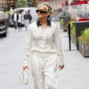 Ashley Roberts – Wearing white trousers and matching top in London - 454 x 681