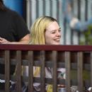 Elle Fanning – Is having a great time with her friends in Los Angeles - 454 x 457