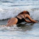 Elisa Isoardi – In a black swimsuit in Fiumicino - 454 x 301