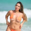 Ara Queen Bae – In a bright orange bikini at the beach in Miami Beach - 454 x 681