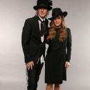 At the CMT awards...Dressed for a funeral? Musician Lisa Marie Presley and Michael Lockwood posed together