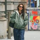 Katie Holmes – In a green olive rain jacket and navy blue rain pants in New York