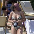 Taylor Dayne in Bikini on the beach in Sardinia - 454 x 629