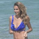 Melissa Satta in Blue Bikini on the beach in Porto Rotondo