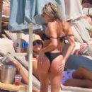 Ashley Roberts – In a black bikini with Janette Manrara on the beach in Mykonos - 454 x 681
