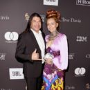 Robert Trujillo and Chloé Barthelemy attend The Recording Academy And Clive Davis' 2019 Pre-GRAMMY Gala at The Beverly Hilton Hotel on February 9, 2019 in Beverly Hills, California - 400 x 600