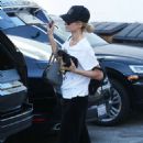 Paris Hilton with her little dog arrives for a dentist appointment in LA