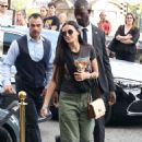 Demi Moore looks effortlessly cool in a Rolling Stones T-shirt as she steps out in Paris with her tiny dog Pilaf