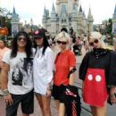 Slash  with Meegan and her daughters at Disney World in Orlando - 454 x 568