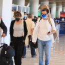 Lisa Rinna – Seen at LAX in Los Angeles - 454 x 551