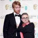 Domhall Gleeson and Carrie Fisher - The EE British Academy Film Awards (2016) - 454 x 609
