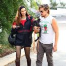 Dylan Sprouse's wife Barbara Palvin puts on a leggy display in knee-high boots as the newlyweds walk their dog in LA