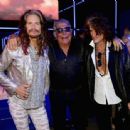 Steven Tyler, Roberto Cavalli and Joe Perry attend the Roberto Cavalli show during the Milan Menswear Fashion Week Spring Summer 2015 on June 24, 2014 in Milan, Italy - 454 x 338