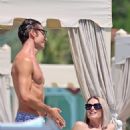 Michelle Hunziker – Seen in Red Bikini at Alpemare Beach in Forte Dei Marmi, Italy - 454 x 681