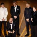 Daniel Brühl, Edward Berger, Malte Grunert, Albrecht Schuch and Felix Kammerer - The 95th Annual Academy Awards  (2023) - 454 x 303