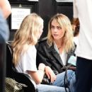Cara Delevingne – Seen with friends at a pub in London’s Notting Hill