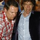 Mick Jagger, L'Wren Scott and Charles Finch at Tetou restaurant, Cannes, France - 19 May 2009 - 454 x 681