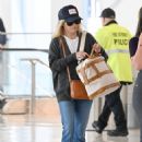Reese Witherspoon – Pictured strolling thru the airport in New York