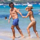 Sylvie Meis – Bikini candids at the beach in Saint Tropez - 454 x 303