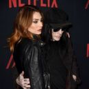 Mick Mars arrives at the premiere of Netflix's 