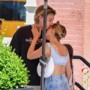 Millie Bobby Brown – Flashes a diamond ring while on the PDA with boyfriend Jake Bongiovi - 454 x 589