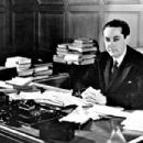 Irving Thalberg The Boy Wonder sitting behind his production desk at MGM - 454 x 302