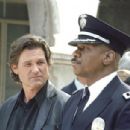 Kurt Russell and Ving Rhames star as Eldon Perry and Arthur Holland