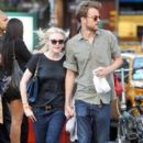 A smitten looking Dakota Fanning and her boyfriend Jamie Strachan go hand in hand for a stroll around New York City - 395 x 594