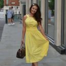 Jess Impiazzi – Out for a stroll in a yellow dress - 454 x 570