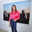 Cindy Crawford during an exhibition hosted by Acne Studios featuring Cindy Crawford, Sam Abell and Amarrillo on at Galerie Edouard Escougnou on September 28, 2018 in Paris, France