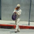 Regina King – Carrying a purple leather Gucci purse in West Hollywood