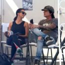 Rocker Tommy Lee and his fiance Sofia Toufa stop by a car wash in Calabasas, California on May 12, 2016. Tommy sat by himself and sent some text messages before returning to Sofia's side - 454 x 508
