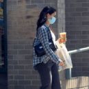 Camila Mendes – Grabbing an iced coffee at a local cafe in Beverly Hills