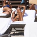 Karrueche Tran – With Chantel Jeffries in a bikinis on the beach in Miami - 454 x 303