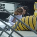 Emma Watson – Is spotted being escorted to a British Airways jet out of LAX - 454 x 568