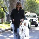 Billy Ray Cyrus takes his dogs out for a relaxing stroll through his neighborhood in Toluca Lake, California on April 4, 2014 - 443 x 594