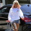 Blac Chyna, Rob Kardashian, King Cairo, and Dream Kardashian Outside Chyna's Home in Reseda, California - June 18, 2017