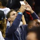 Juan Pablo Galavis attends a Miami Heat basketball game with friends on December 17, 2014 in Miami, Florida