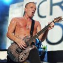 Phil Collen - During Def Leppard’s performance at the Cruzan Amphitheatre in West Palm Beach, Florida on June 15, 2011 - 454 x 567