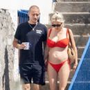 Caroline Vreeland – In a red bikini in Positano - 454 x 446