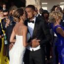 Ex-AC Milan player marries his model girlfriend in a lavish Sardinian ceremony with TWO wedding dresses, Tiffany rings and a surprise gig by Andrea Bocelli