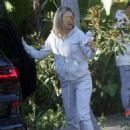 Kate Hudson – Gets playful with her fiance Danny Fujikawa in Los Angeles