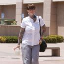Janine Lindemulder speaks with reporters outsidet the Lamoreaux Justice Center to hear an expected ruling on visitation rights in her child-custody battle with ex-Jesse James. Lindemulder is fighting for visitation rights with their 6-year-old daughter - 396 x 594