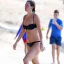 Rhea Durham in Black Bikini on the beach in Barbados