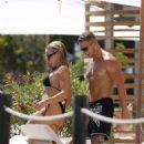 Gabby Allen – In a black bikini by the pool at Nobu Hotel in Ibiza - 454 x 576